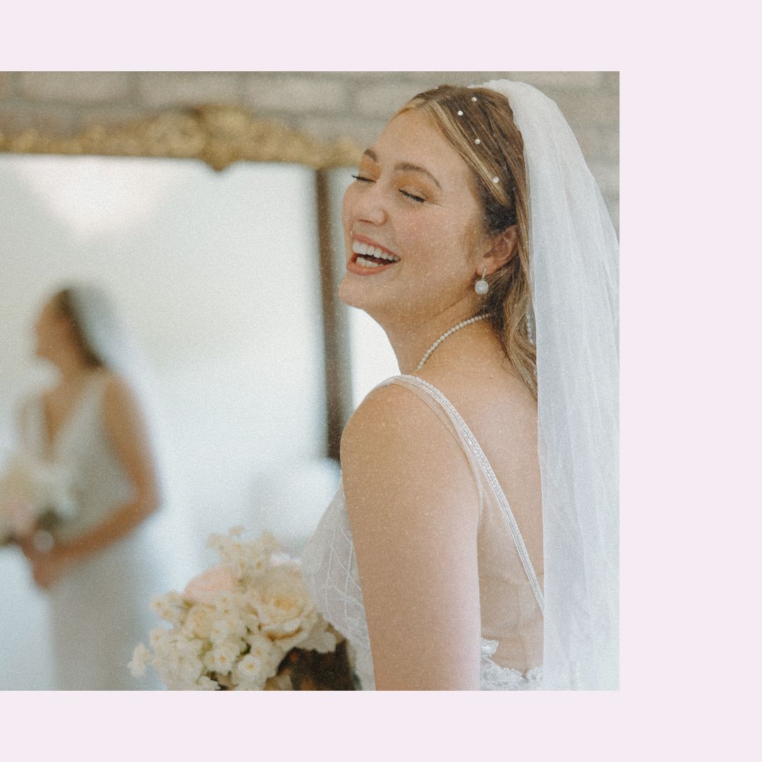 Bride laughing in soft natural light